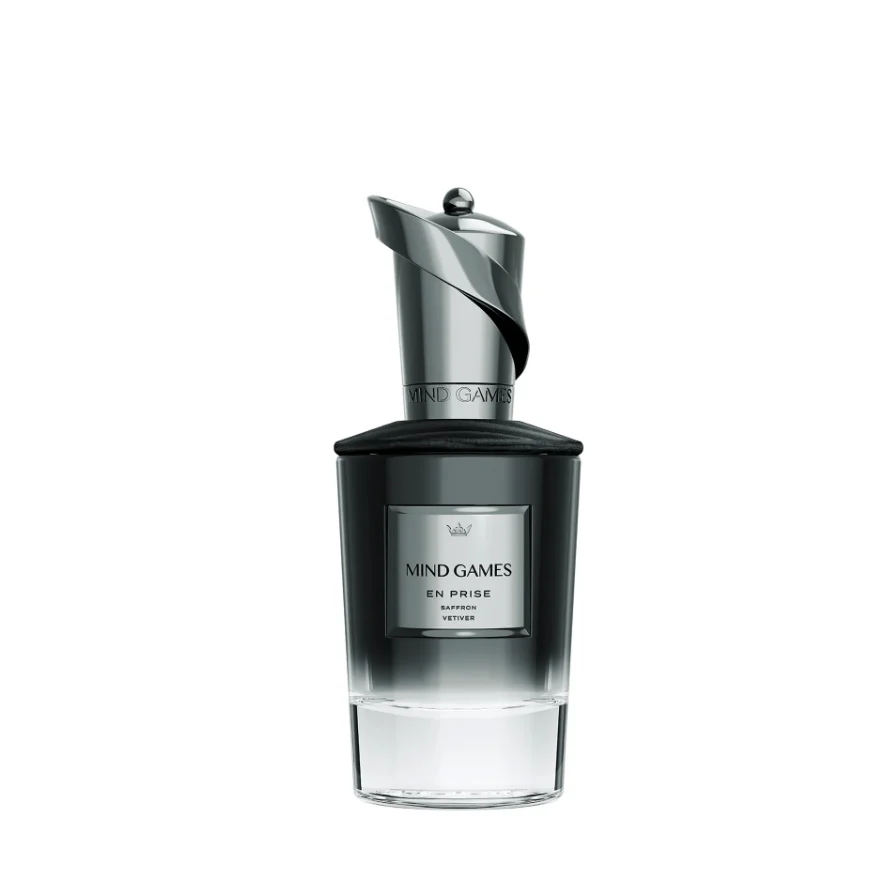 Mind Games En Prise luxury woody citrus perfume in a heavy glass bottle with a chess piece cap