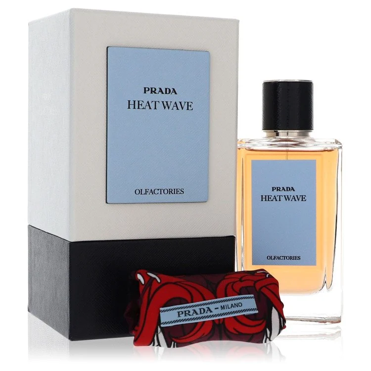 A bottle of Prada Heat Wave luxury floral perfume with its signature silk pouch
