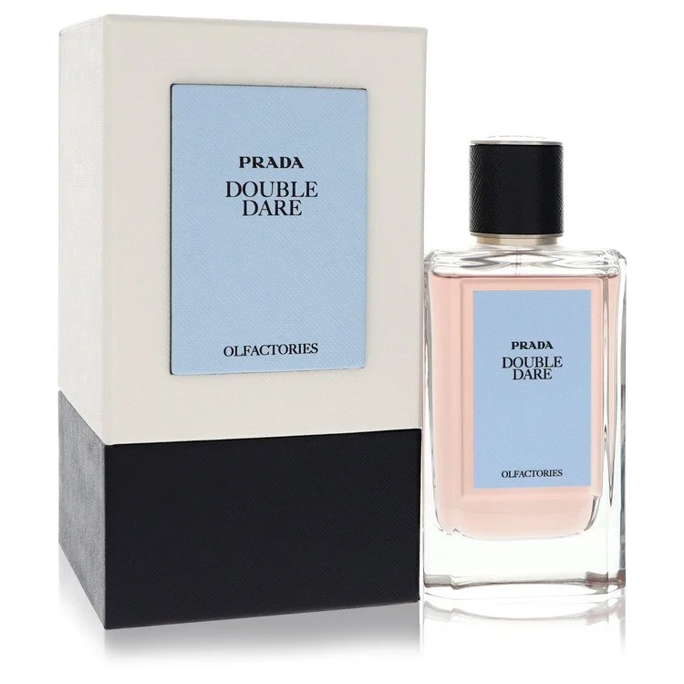 A bottle of Prada luxury leather fragrance resting on fine silk