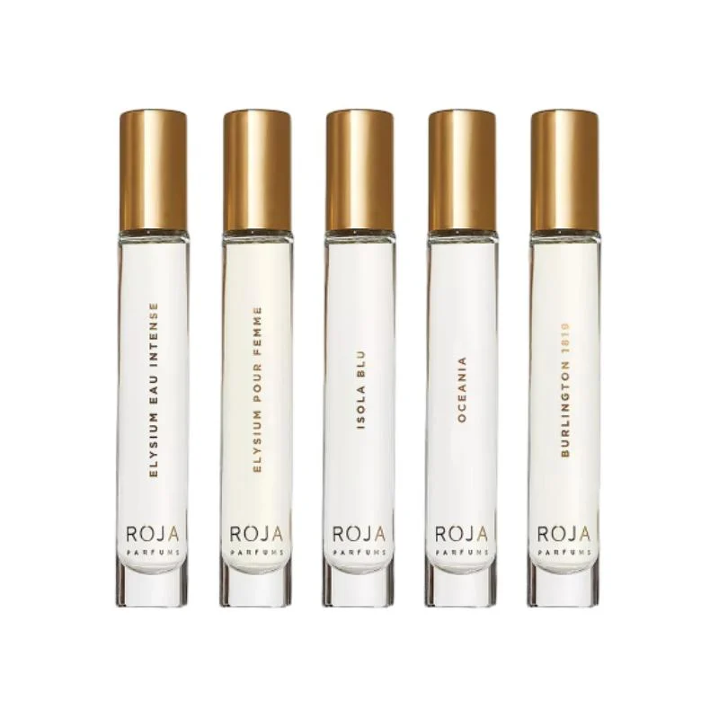 A luxury fragrance discovery set showcasing five elegant travel sprays from Roja Parfums - Roja Discovery Set