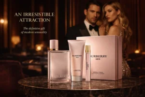 Burberry Her perfume bottle, travel spray, and lotion in a pink commemorative gift box.