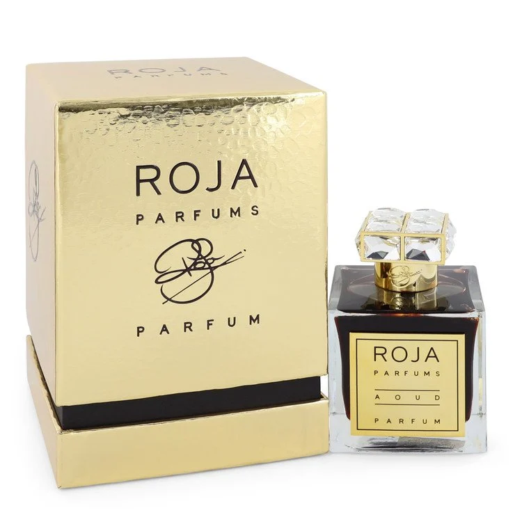 A stunning bottle of luxury oud perfume with a crystal gold cap