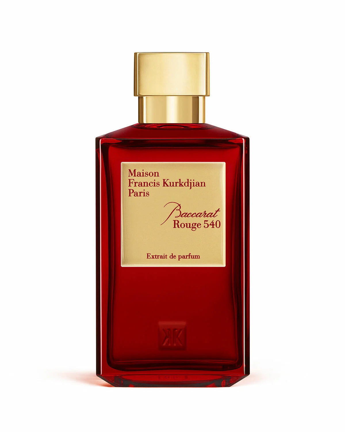 A bottle of baccarat rouge 540 extrait showcasing its signature red glass and gold accents