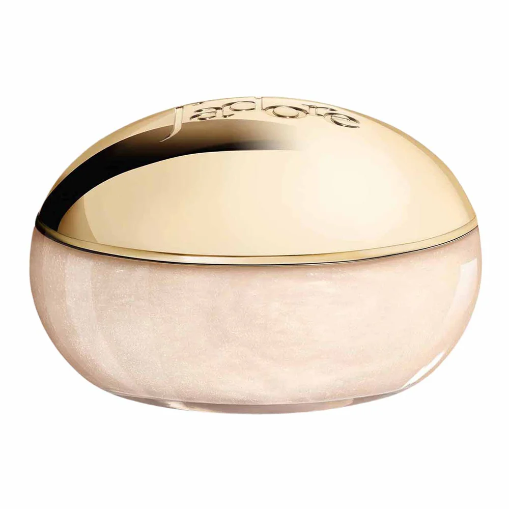 The Dior J'adore Shimmering Scrub in its glass jar