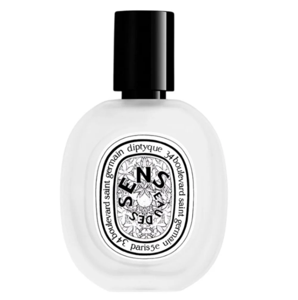 The Diptyque Eau Des Sens Hair Mist on a luxury vanity