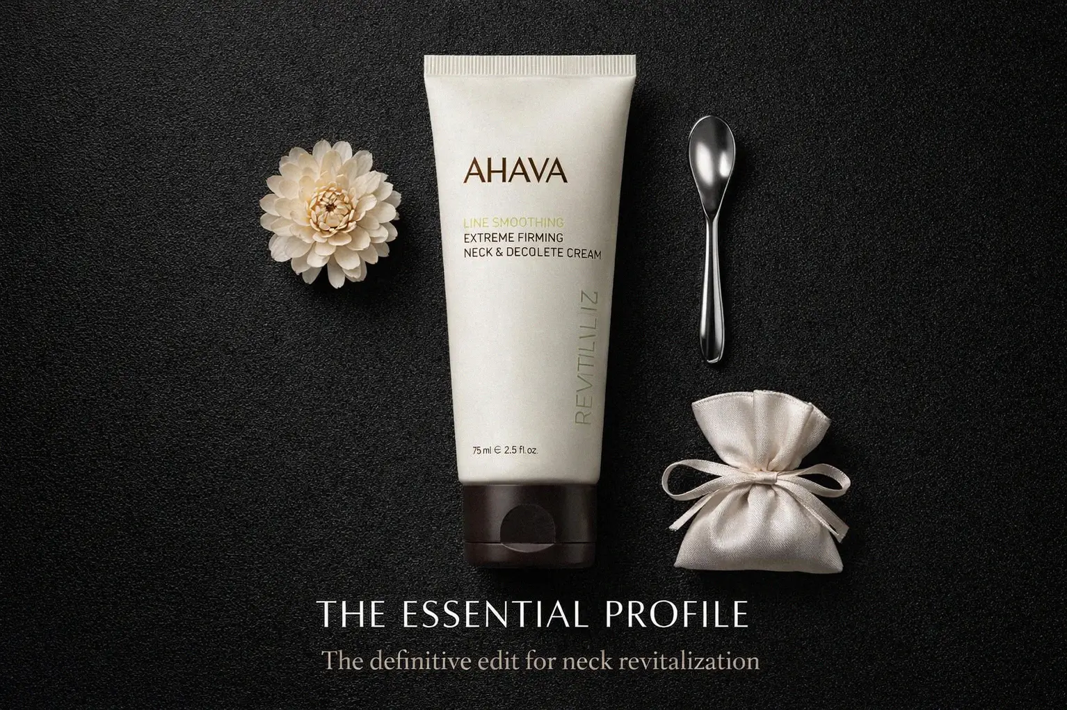 White jar of AHAVA Time to Revitalize Extreme Firming Neck Cream on a marble vanity surface.