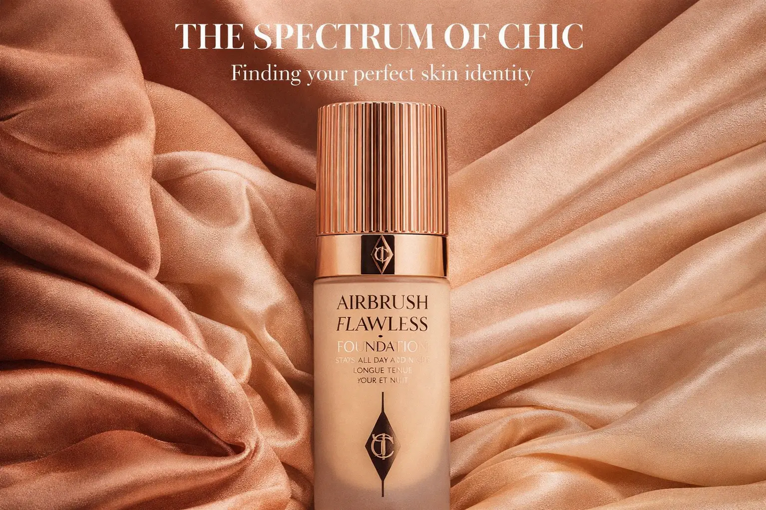 Elegant bottle of Charlotte Tilbury Airbrush Flawless Longwear Foundation on a chic makeup vanity.