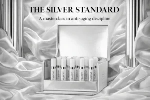 Set of fourteen sleek Valmont Time Master Face Intensive Program serum vials in a luxury white presentation box.