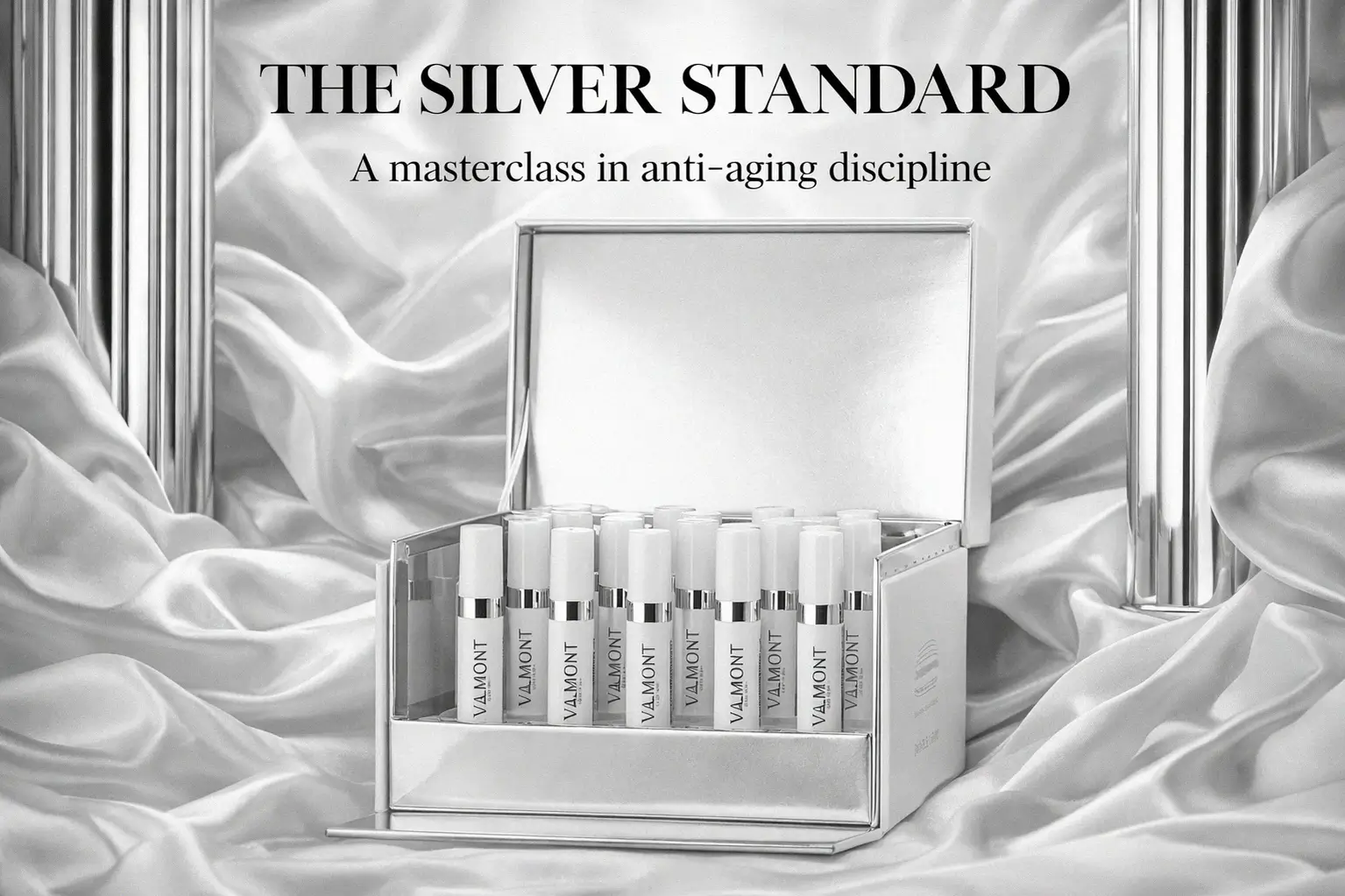 Set of fourteen sleek Valmont Time Master Face Intensive Program serum vials in a luxury white presentation box.