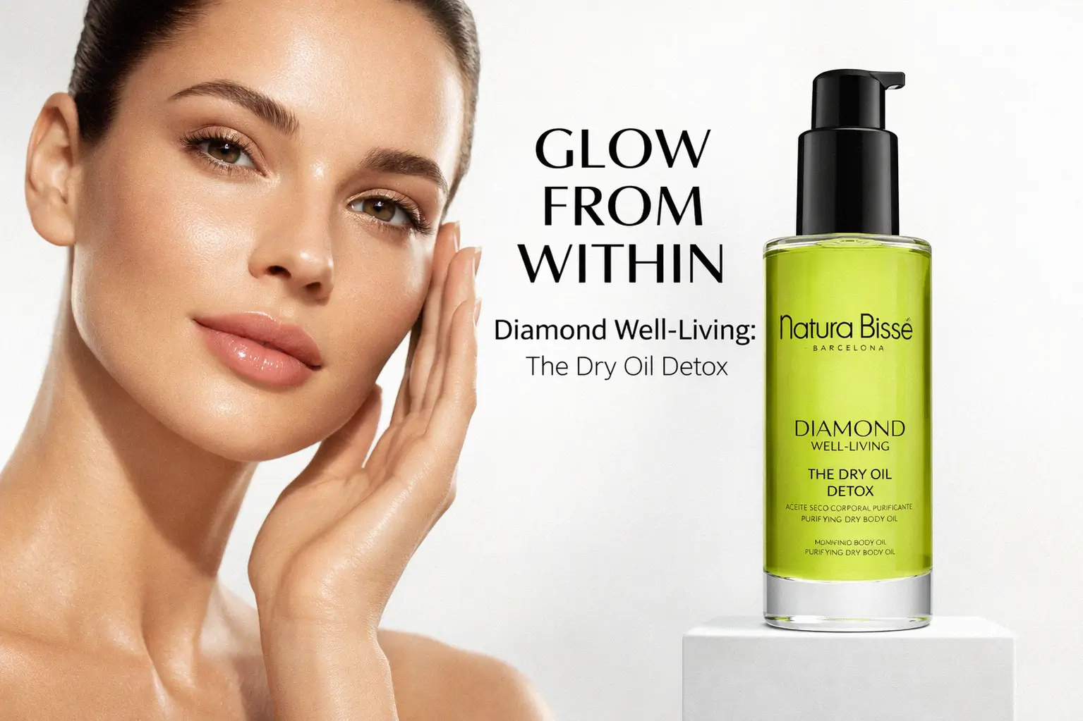 Natura Bissé Diamond Well-Living Detox oil in a sleek glass spray bottle on a marble surface.