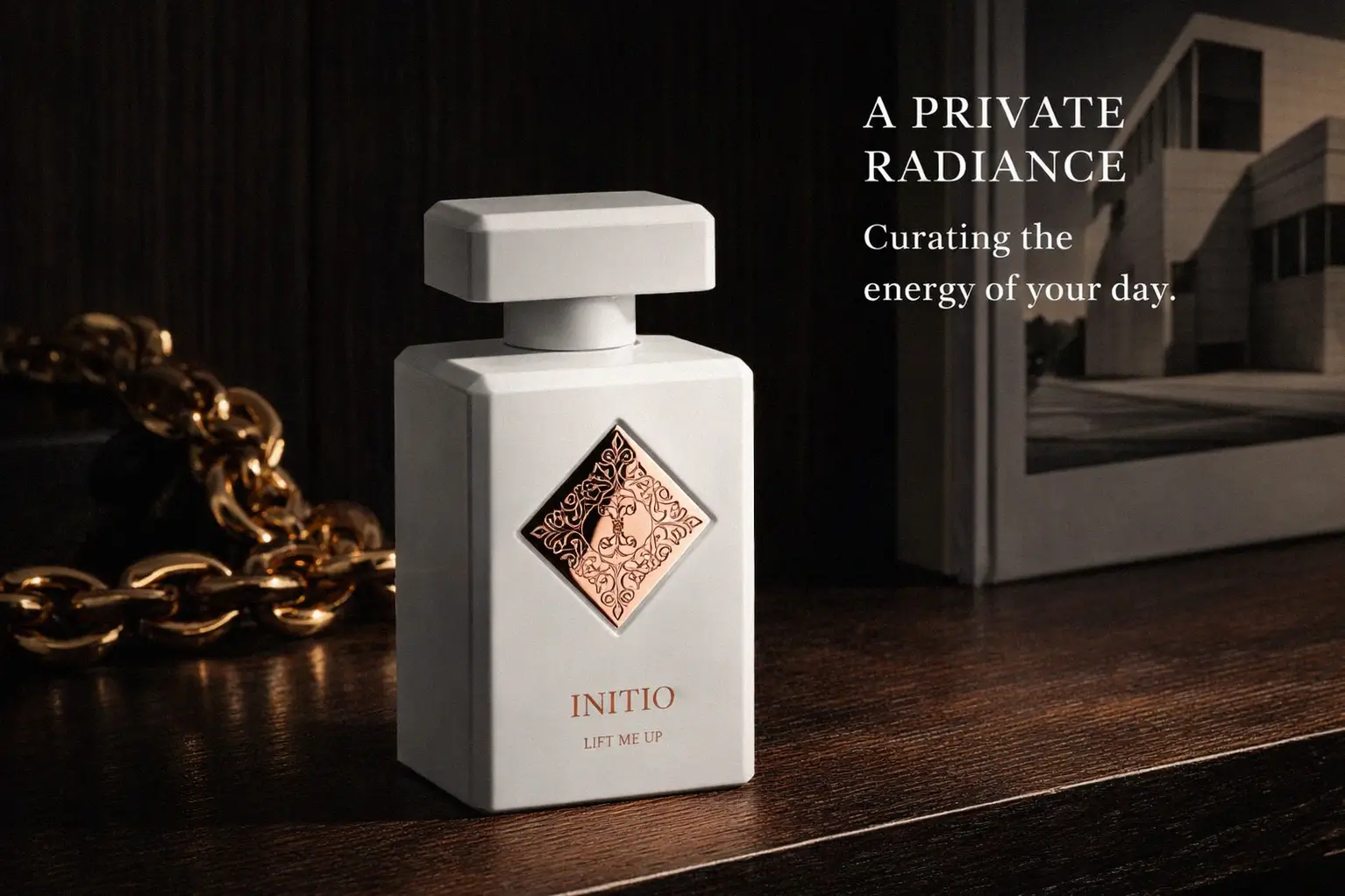 A sleek 90 ml bottle of Initio Parfums Prives Lift Me Up Extrait De Parfum on a minimalist white surface.