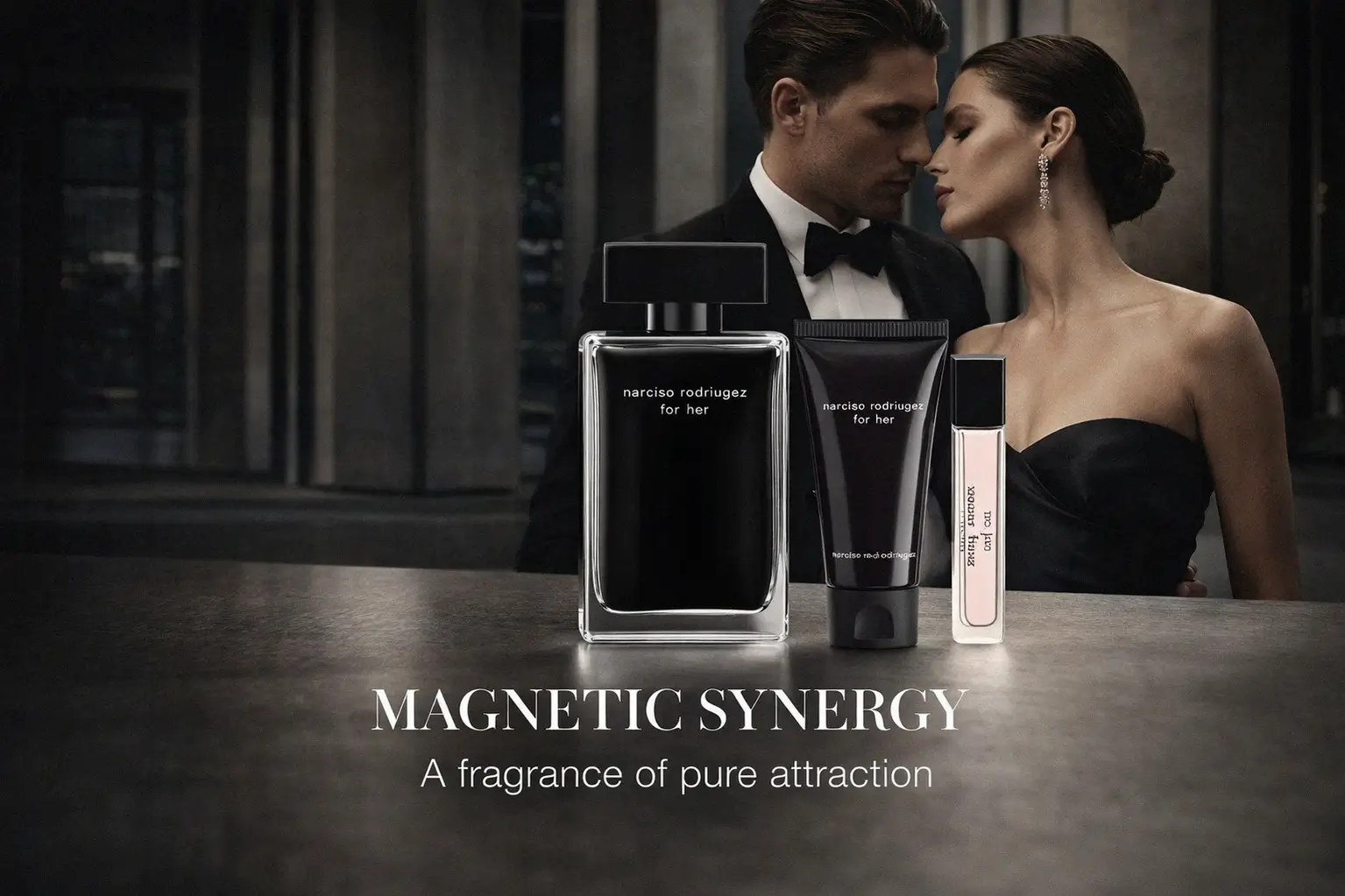 A black Narciso Rodriguez perfume bottle with a pink gift box and lotion.
