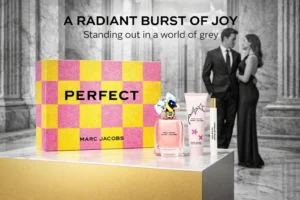 Three-piece Marc Jacobs Perfect gift set featuring a perfume bottle with a charm-adorned cap.