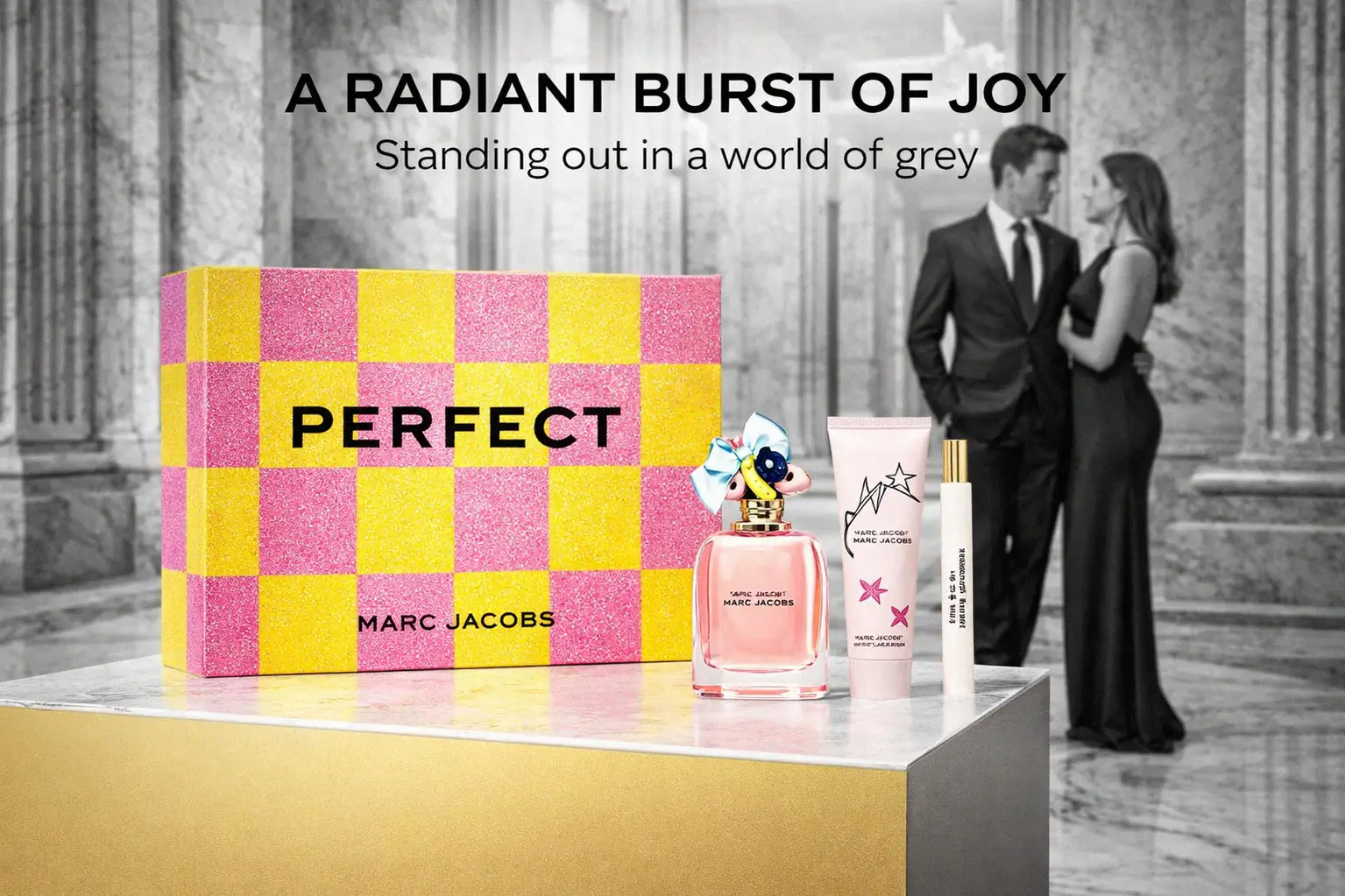 Three-piece Marc Jacobs Perfect gift set featuring a perfume bottle with a charm-adorned cap.