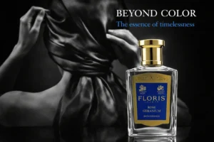 Elegant 50ml Floris London glass bottle of Rose Geranium Bath Essence on a polished bathroom shelf.