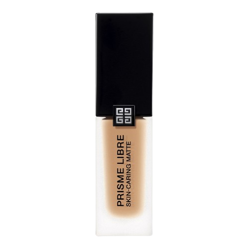 A bottle of Prisme Libre Skin-Caring Matte Foundation on a minimalist vanity