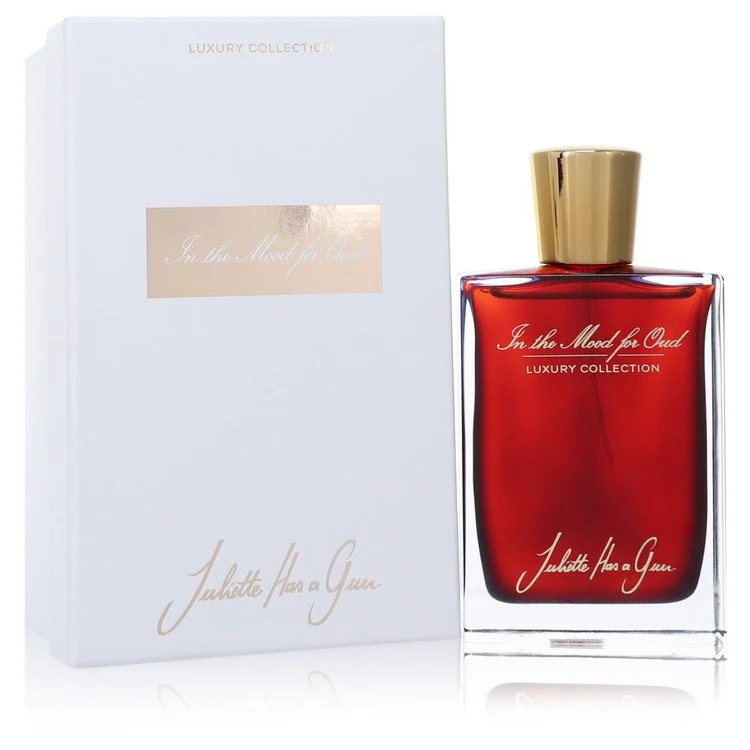 Juliette Has A Gun In The Mood For Oud bottle on a dark surface