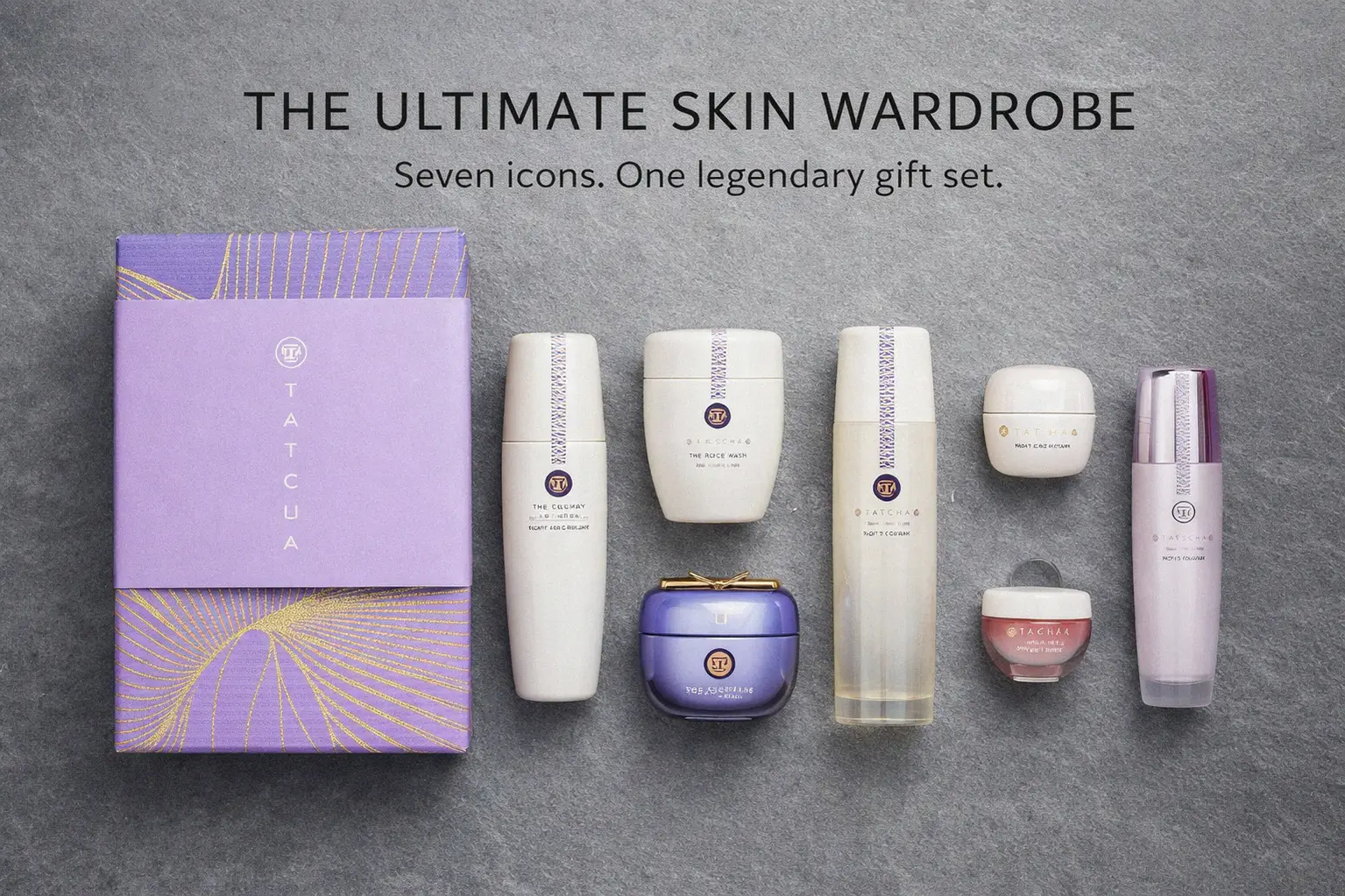 The 7-piece Tatcha Luxury Kiri skincare set arranged on a clean vanity with elegant purple and white jars.