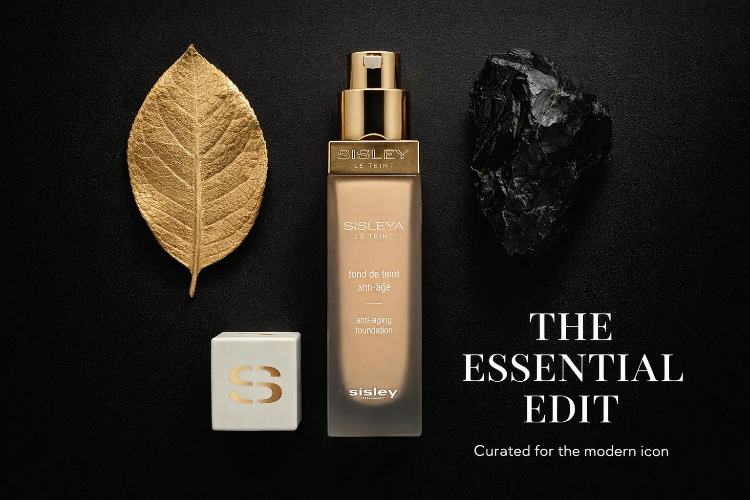 A sleek Sisley Paris Sisleya Le Teint foundation bottle with a pump, showing its elegant design on a vanity.