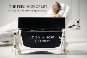 Givenchy Le Soin Noir Crème Légère in a sleek black refillable glass jar with a white cream texture.