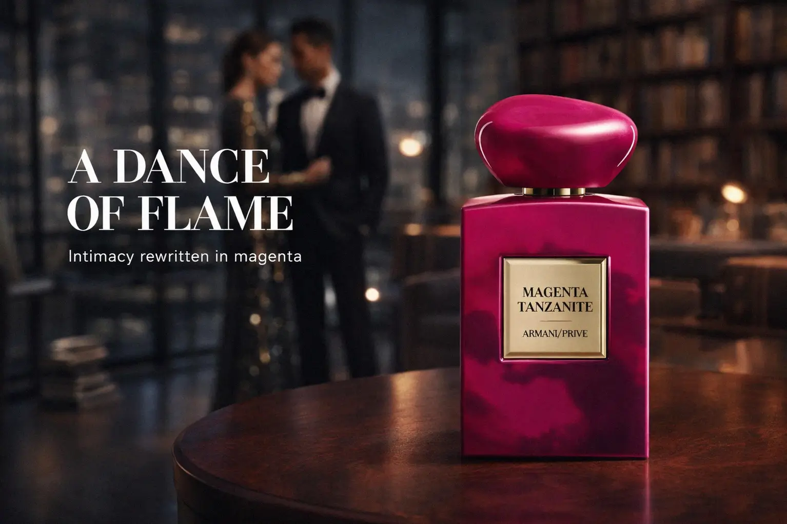 Square deep magenta glass bottle with a gold cap and label on a minimalist vanity.