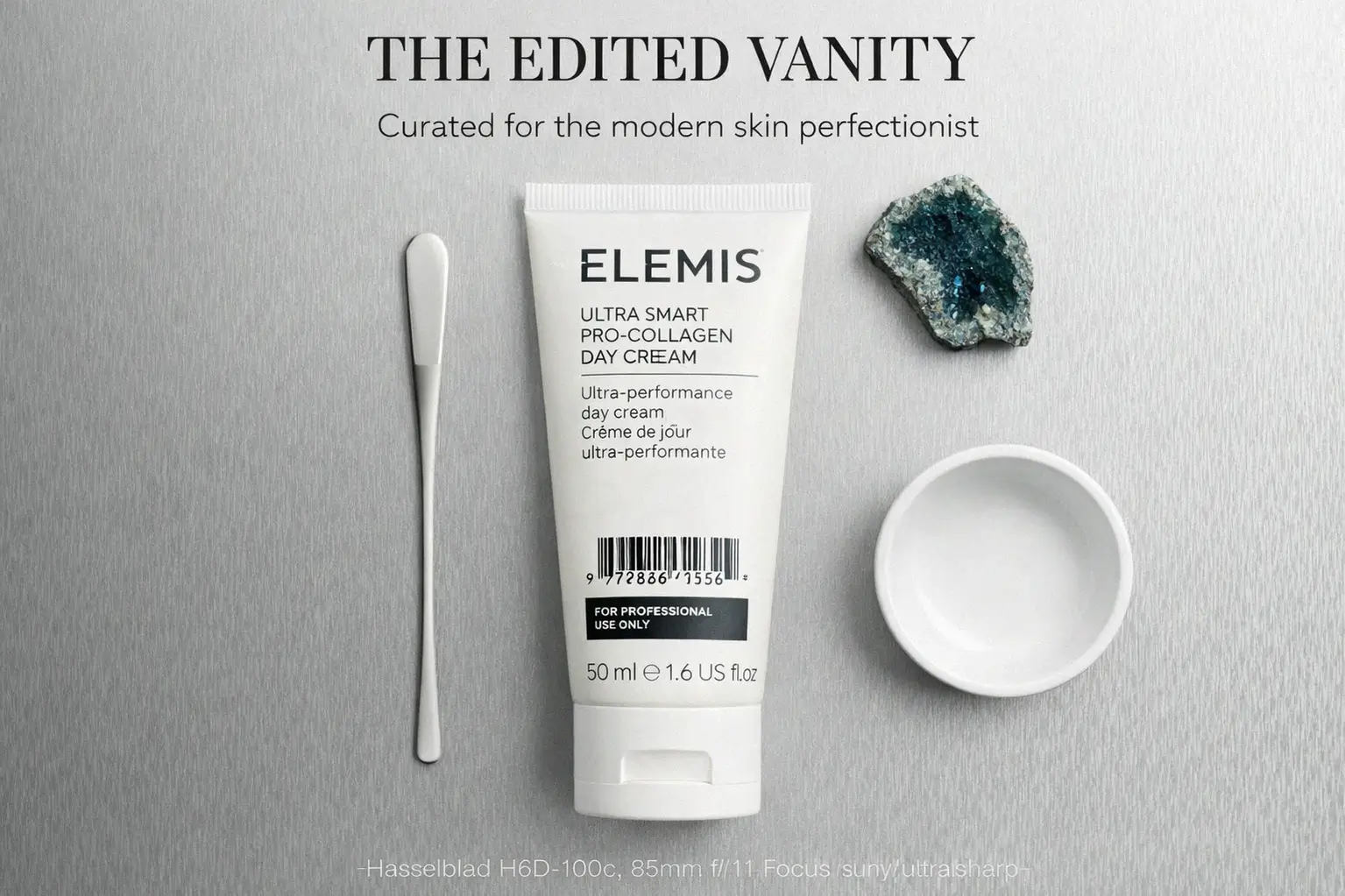 Silver jar of Elemis Ultra Smart Pro-Collagen Day Cream on a clean white vanity surface.