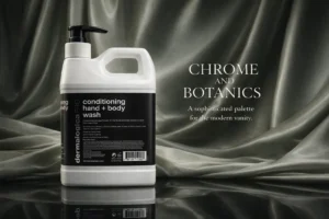 A 10 oz pump bottle of Dermalogica Conditioning Hand + Body Wash on a clean marble bathroom counter.