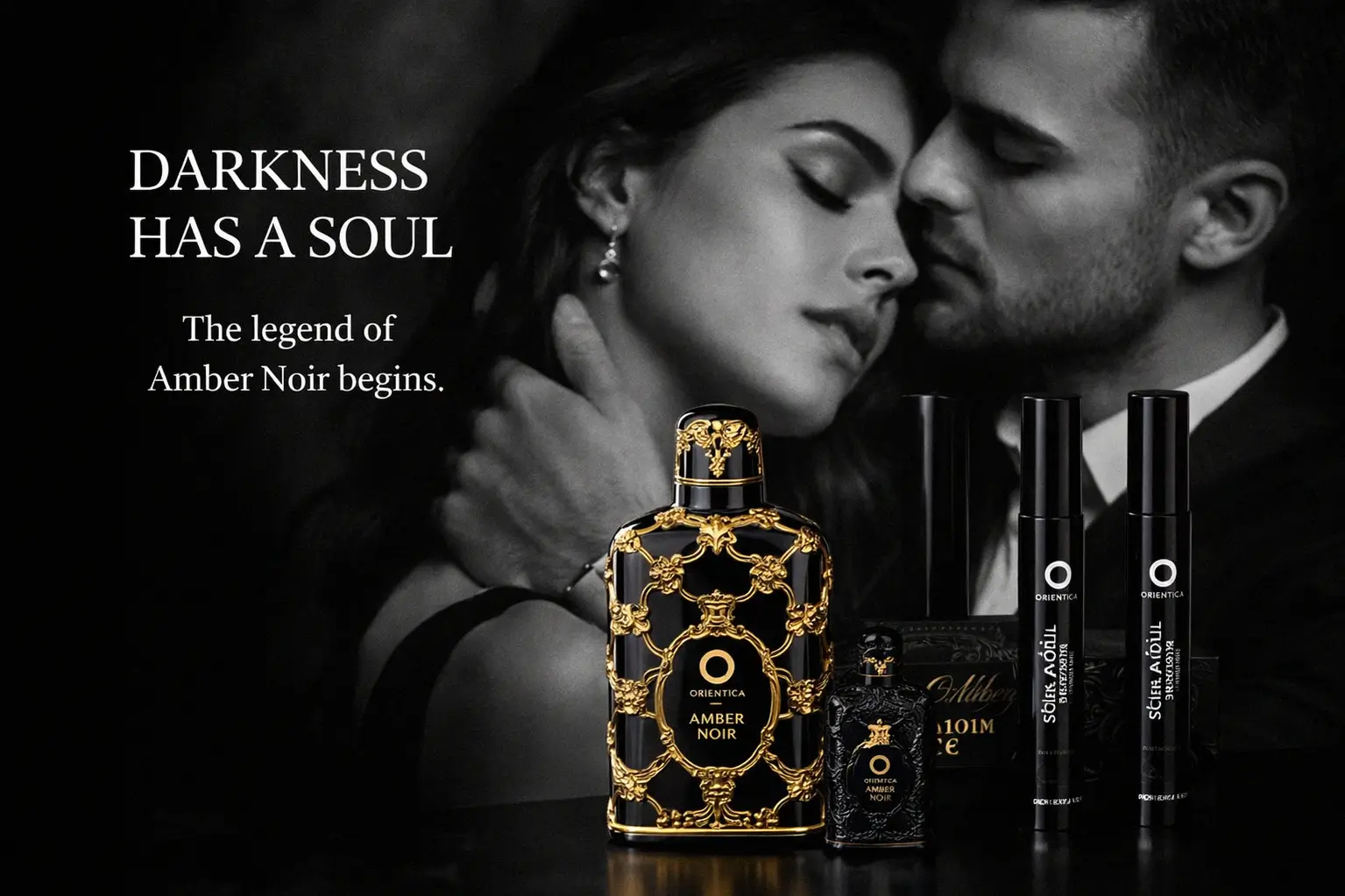A luxury 4-piece Orientica Amber Noir gift set with a large glass bottle and three sleek travel-size sprayers.