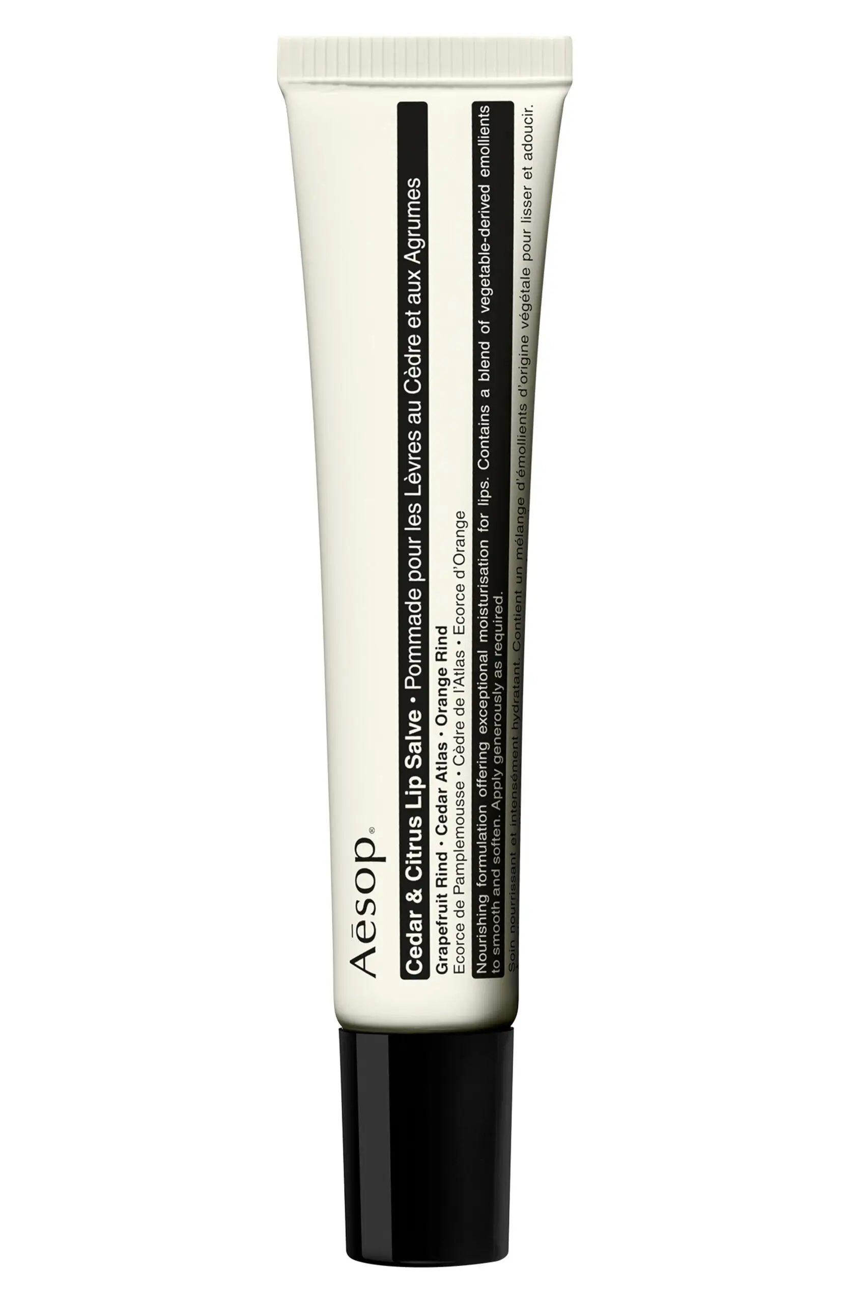 The Aesop Cedar & Citrus Lip Salve in its signature aluminum tube