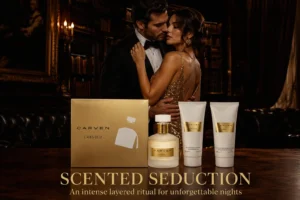 A luxury white and gold box containing Carven L'Absolu perfume, body lotion, and shower gel bottles.