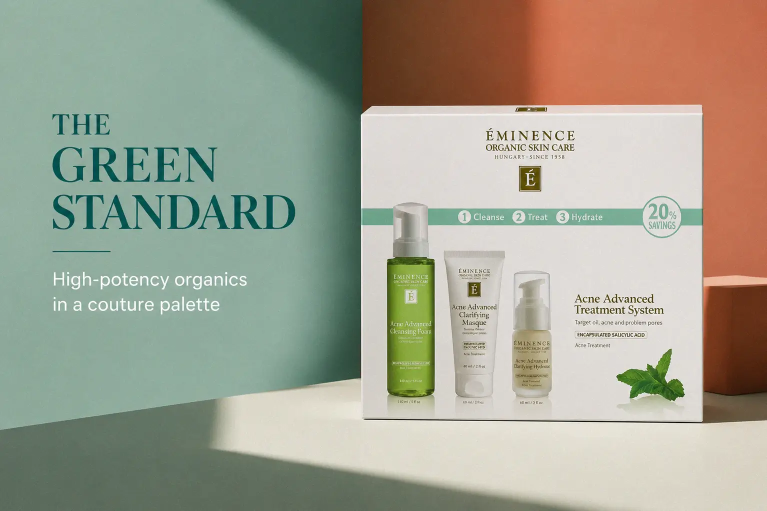 Three green and white bottles of the Eminence Organic Acne Advanced System on a white surface.