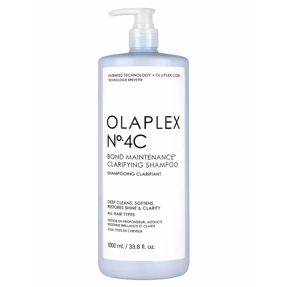 Olaplex No. 4C Clarifying Shampoo bottle in a luxury bathroom