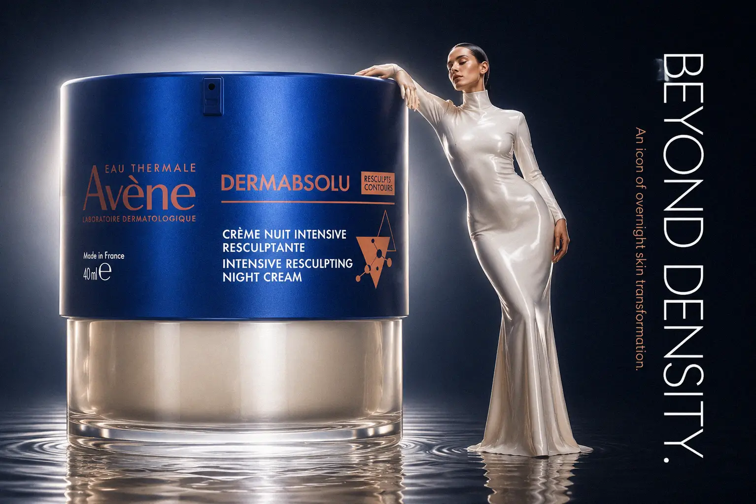 Airless pump jar of Avène Dermabsolu Intensive Resculpting Night Cream on a clean vanity surface.