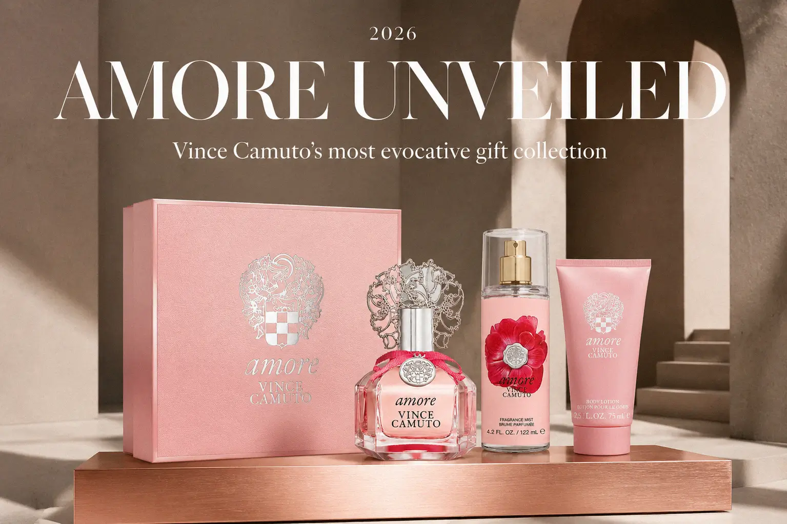 Three-piece Vince Camuto Amore gift set with pink perfume bottle, fragrance mist, and shower gel.