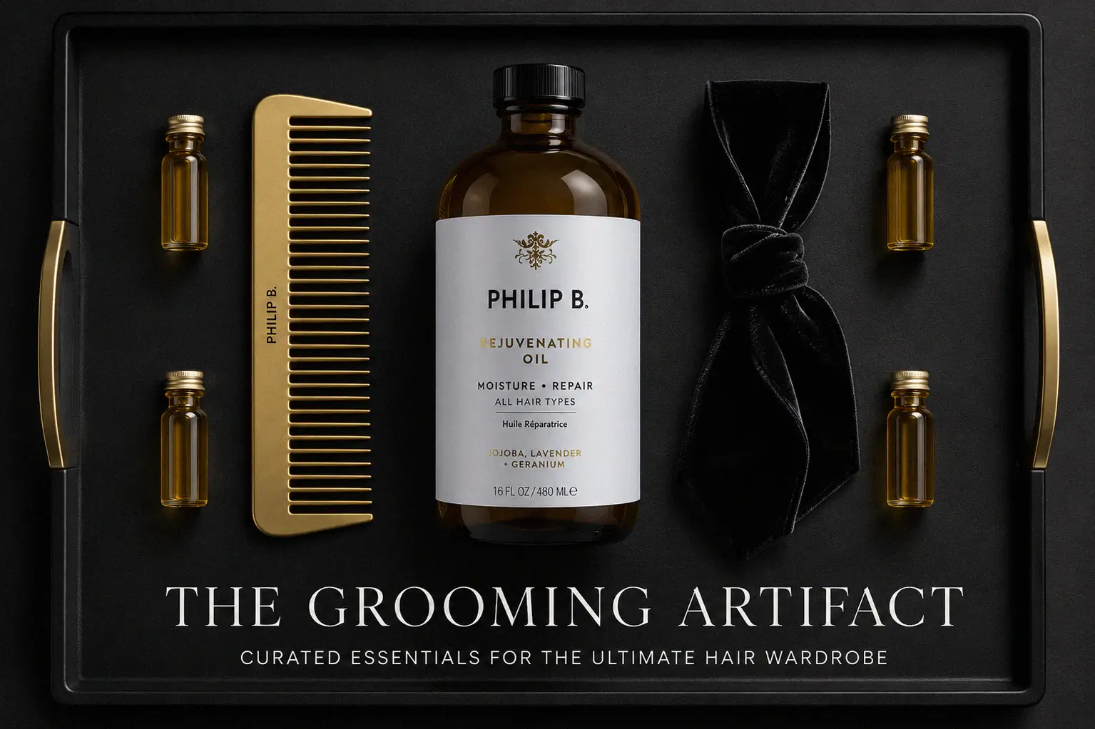 Large 16 oz bottle of Philip B Rejuvenating Oil on a white marble surface with lavender sprigs.