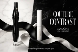 Lancôme Le 8 Hypnôse glass mascara tube and Cils Booster XL primer displayed on a clean surface.