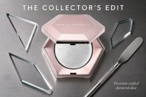 A faceted jewel-like compact opening to reveal a glittering silver Fenty Beauty highlighter powder.