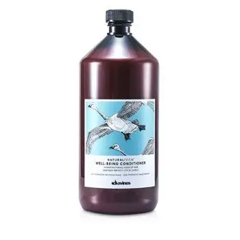 The Davines Well-being Conditioner on a polished marble vanity