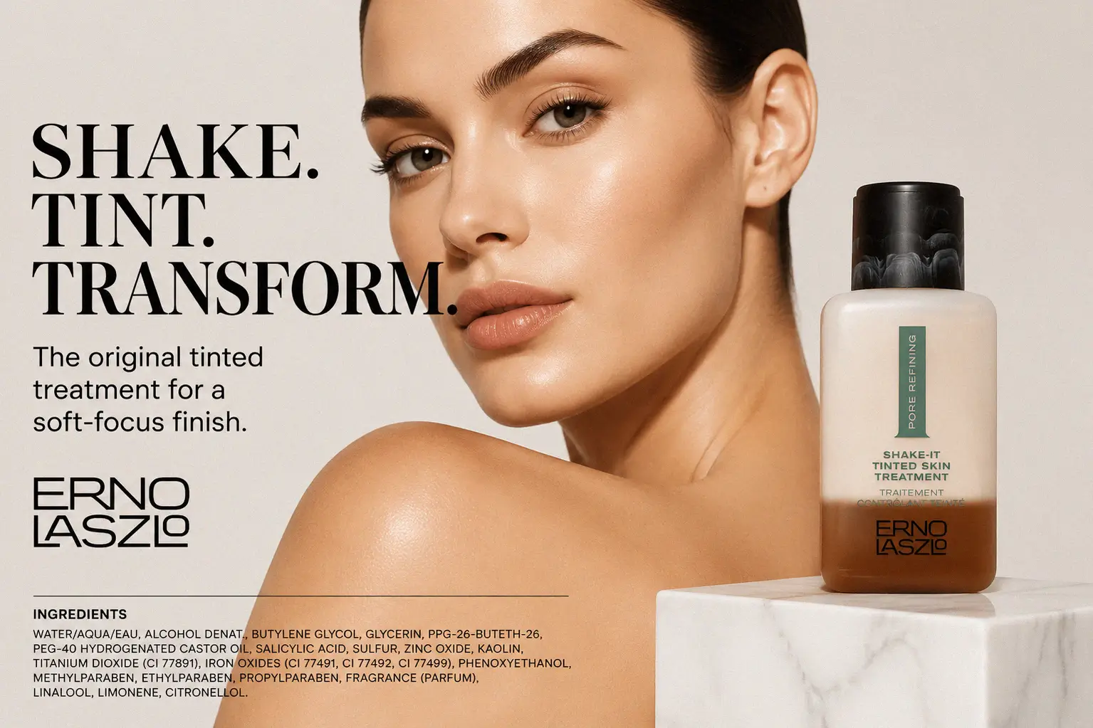 A frosted glass bottle of Erno Laszlo Shake-It Tinted Skin Treatment showing its dual-phase liquid formula.