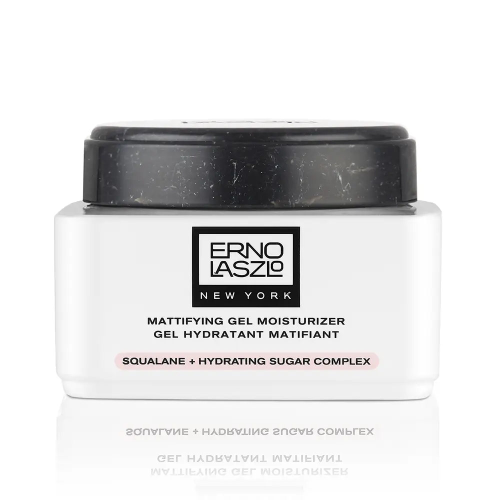 The elegant Erno Laszlo Mattifying Gel Moisturizer jar on a polished marble surface
