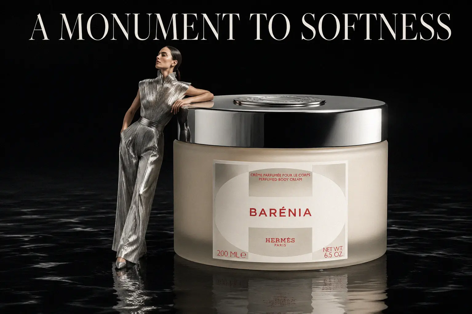 A 200ml jar of Hermès Barénia Perfumed Body Cream in elegant white and gold luxury packaging.