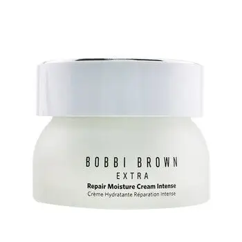 The lush texture of Bobbi Brown Extra Repair Moisture Cream Intense on a gold palette