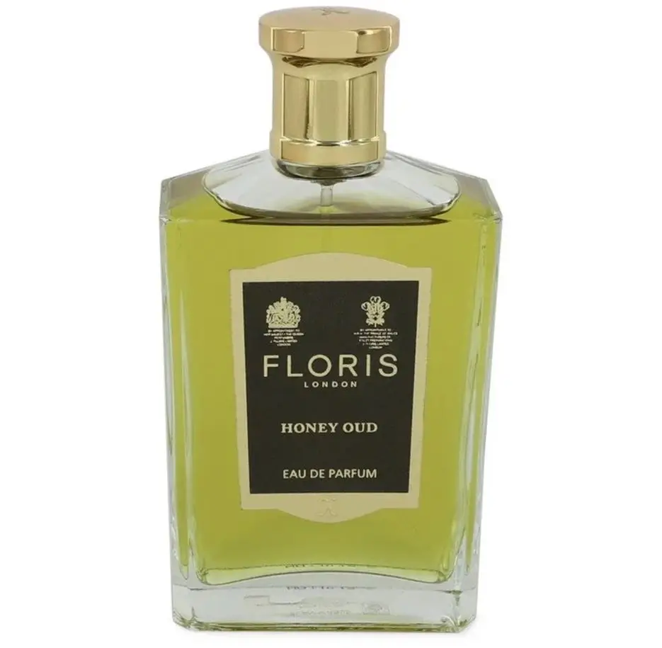 The golden glow of Floris London Honey Oud perfume bottle