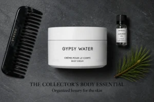 Minimalist white jar of Byredo Gypsy Water Body Cream resting on a clean, light marble surface.
