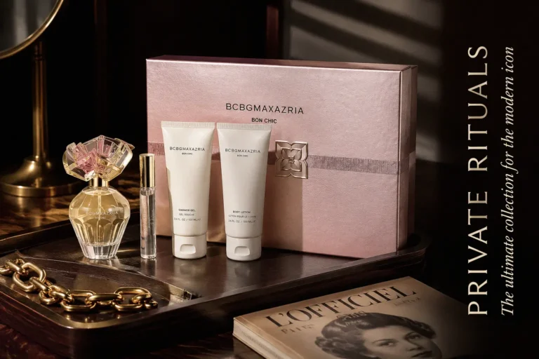 A 4-piece BCBGMAXAZRIA Bon Chic perfume gift set featuring a decorative gold bottle with a flower topper.