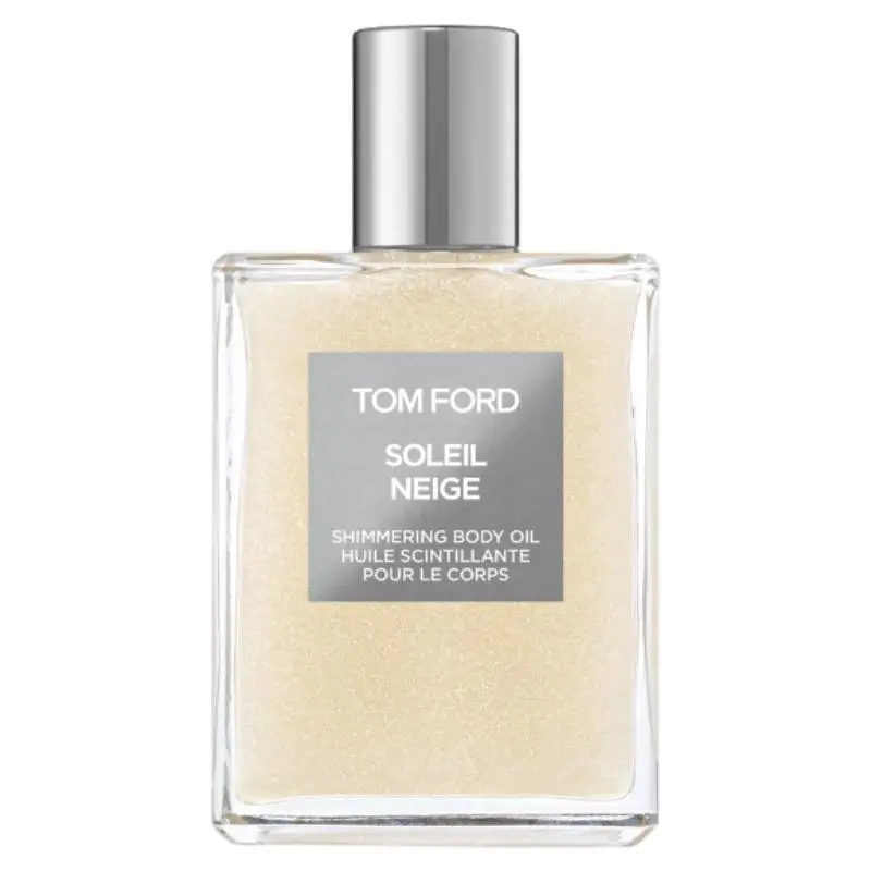 TOM FORD Soleil Neige Shimmering Body Oil on a marble vanity
