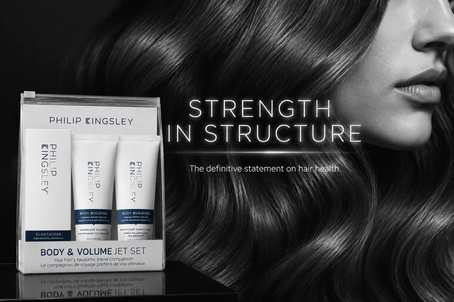 Three white tubes of Philip Kingsley Body and Volume Jet Set arranged neatly on a clean white surface.